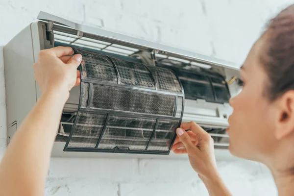 What happens during a professional air conditioning repair service