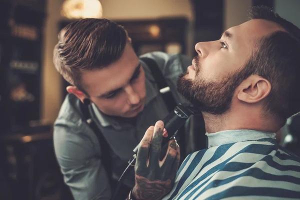 Barber Chair Upholstery: Leather vs. Fabric Choices